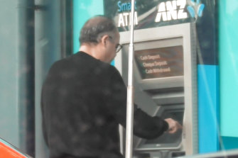 Adem Somyurek is captured on covert recordings withdrawing wads of cash to pay for fake memberships. 