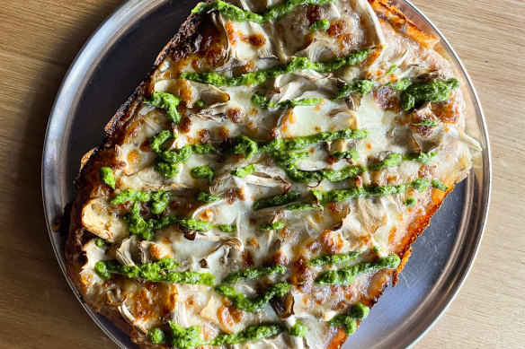 The kitchen buys some of its mushies from urban farmers The Mushroom Guys to make pizzas like this mushroom deep dish. 