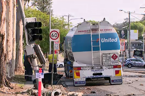 A diesel tanker struck a pole at a Mitchelton intersection, spilling its load onto the road.