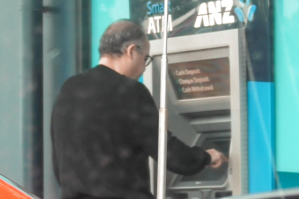 Adem Somyurek is captured on covert recordings withdrawing wads of cash to pay for fake memberships. 