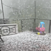 Queensland residents took to social media to post videos of their backyards filled with thick hail which resembled snow.