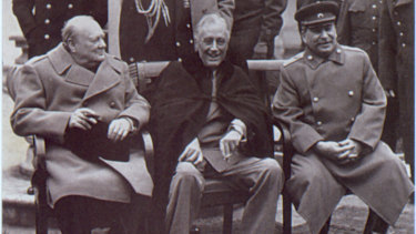 Churchill, Roosevelt and Stalin get some fresh air during the Yalta conference which was characterised by a lingering pall of smoke.