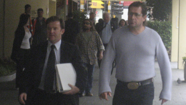 Troy Mercanti (right) leaving court in 2007, facing assault charges for a nightclub incident. 
