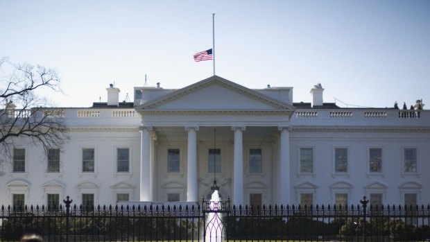 The White House flag will remain at half-mast until John McCain is buried.