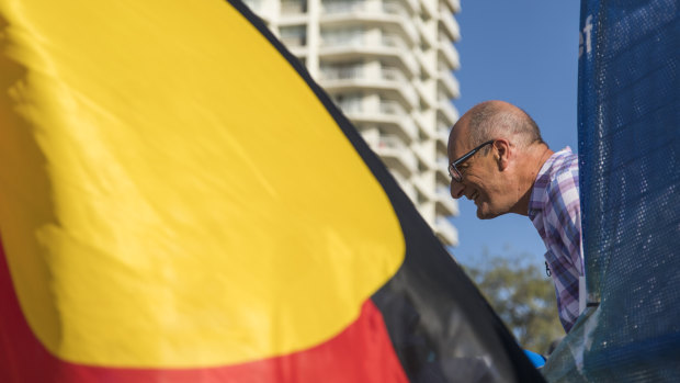 David Koch seen smiling during the Aboriginal protest earlier in the week.