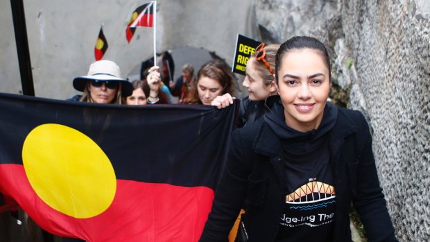 Cheree Toka and fellow demonstrators carried an Aboriginal flag up the steps of the Sydney Harbour Bridge during a demonstration in Sydney in 2018.
