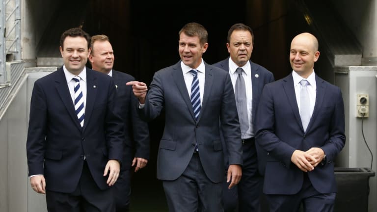 Main player: Kyle Patterson, second from right, with Minister of Sport Stuart Ayres, former ARU CEO Bill Pulver, former Premier Mike Baird, and NRL chief Todd Greenberg at ANZ Stadium.