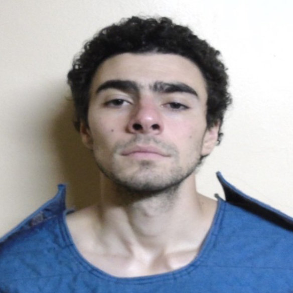 The arraignment photo of Luigi Mangione.