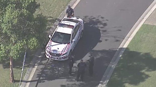 Queensland Police remain on scene at Springfield after a 16-year-old boy was shot.