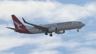 A Qantas Boeing 737 landing at Sydney Airport in February. Since then, short interest in the airline has been climbing.