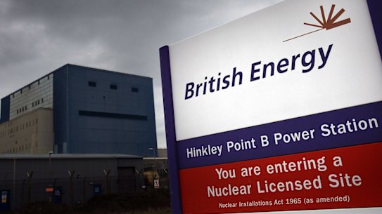 A British Energy sign is displayed in front of a nuclear power station on  near Bridgwater, England.