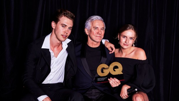 Baz Luhrmann with young stars Austin Butler - cast as Elvis Presley - and Olivia DeJonge - cast as Priscilla Presley. 