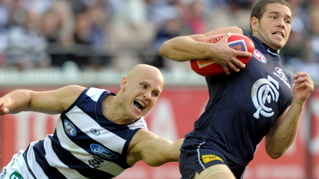 Gary Ablett tackles Aaron Joseph in 2010. 