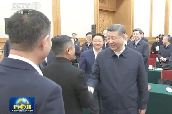 Xi Jinping (right) shaking hands with Jack Ma in Beijing.