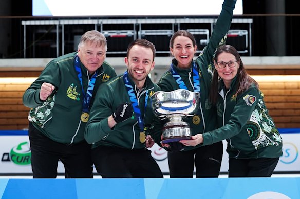 Australian pair Tahli Gill and Dean Hewitt celebrate winning curling’s world mixed doubles championship.