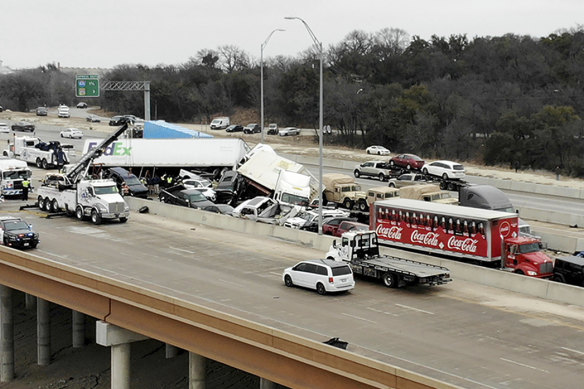 First responders work the scene of the fatal crash on I-35 near downtown Fort Worth.