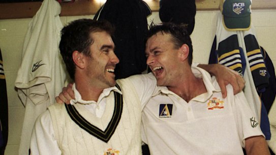 Justin Langer and Adam Gilchrist celebrate a Test win against Pakistan in 1999.