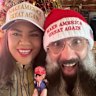 Coalition Senator Jacinta Nampijinpa Price poses in a MAGA cap with her husband Colin Lillie in this Yuletide snap taken from her social media page.