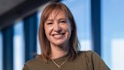 MYOB chief people officer Sally Elson with staff at their Melbourne offices discusses AI adoption and why HR managers need to be involved.