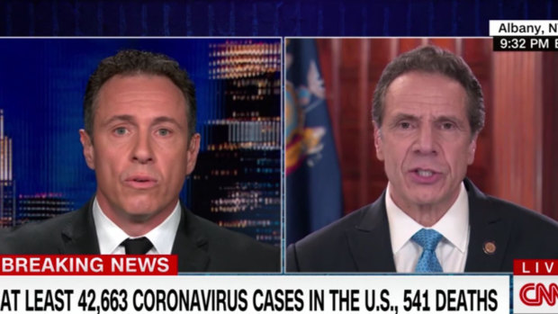New York Governor Andrew Cuomo, right, is interviewed by his brother, CNN host Chris Cuomo, earlier this week. 