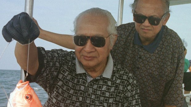 Indonesia's then-President Suharto, left, and Vice-President Bacchuridin Jusuf Habibie enjoy a fishing trip in 1997.