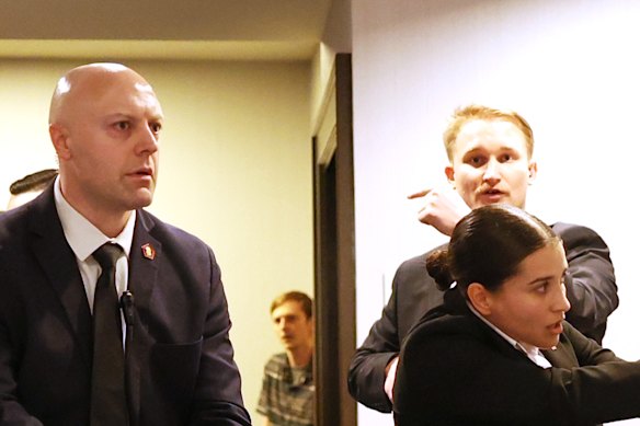 Secret Service agents springing into action at the hotel.