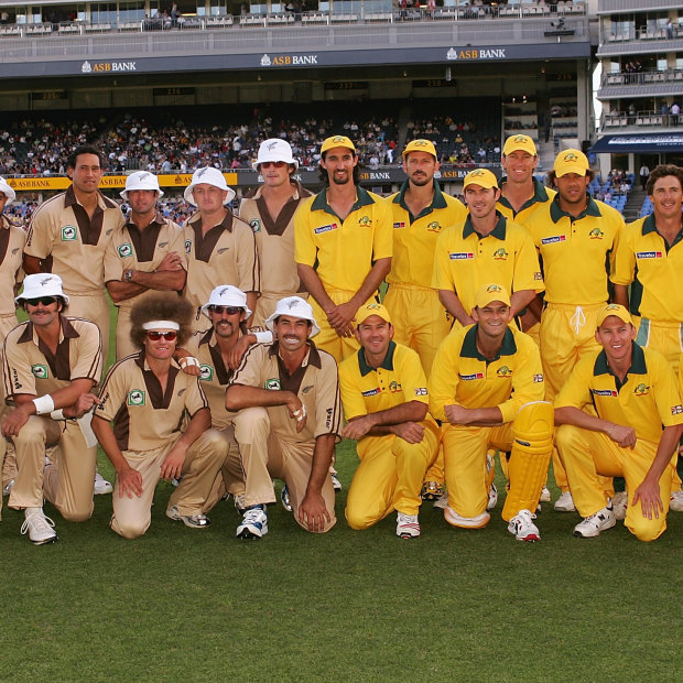 The New Zealand and Australian teams pose in their retro uniforms before the first Twenty20 International in 2005.