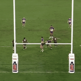 Harry Grant scores from dummy-half with the defence watching for the field goal.