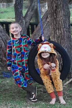 Cooper and Jasmine Hill at home for the first time in 14 months in Nana Glen last week, before fleeing the fires.