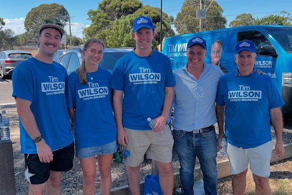 Wilson (second from right) posing with campaign staff.