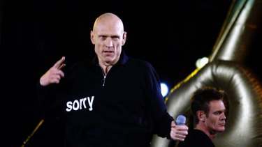 Peter Garrett and Midnight Oil at the closing ceremony of the Sydney 2000 Olympics.