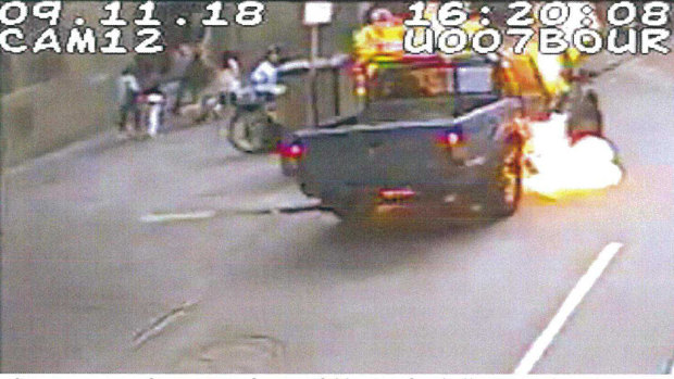 CCTV footage of a fireball surrounding the passenger compartment.