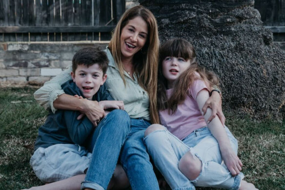 Megan Maack (centre) and her children Isla, 14 (right) , and Jude, 12. 