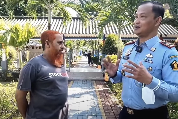 Patek with prison governor Jalu Yuswa Panjang.