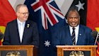 Prime Minister Anthony Albanese with his PNG countrpart, James Marape, at a signing on Wednesday.