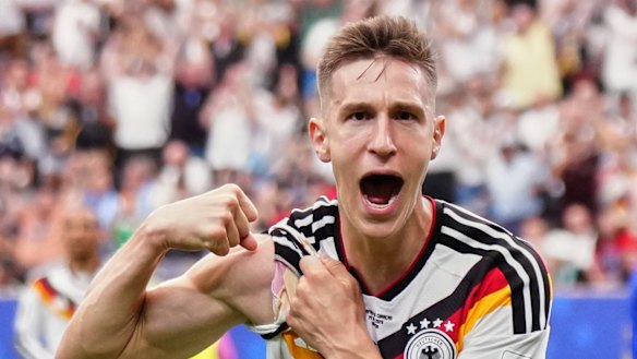 Germany’s Nico Schlotterbeck celebrates after scoring his side’s second goal during the World Cup Group E soccer match between Germany and Curacao in Houston, Sunday, June 14, 2026.