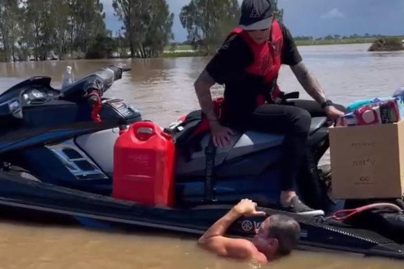 The Mick Fanning-led flood relief team deliver supplies to Coraki