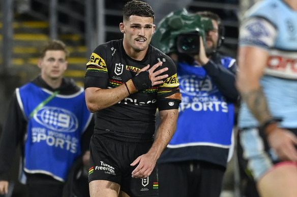 Nathan Cleary clutches his left shoulder during the preliminary final.