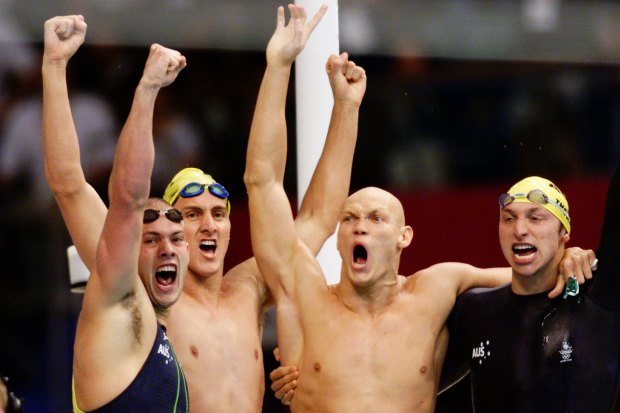 Ashley Callus, Chris Fydler, Michael Klim and Ian Thorpe celebrate their gold in the 4x100m relay. The Australians set a world record of 3:13.67 while Klim also broke the individual world record, finishing his leg in 48.18s. 
