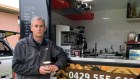 About half of the customers who come to Darren Jackon's Wodonga coffee cart come from Victoria. 