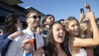 Revellers go berserk after the Everst race at Royal Randwick Racecourse. Sydney. 