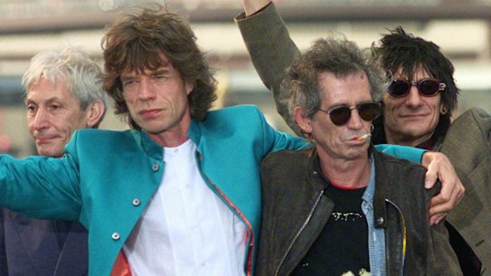 The Rolling Stones, then mere 50-somethings, announce their “Bridges to Babylon” tour beneath the Brooklyn Bridge in 1997. From left, Charlie Watts, Mick Jagger, Keith Richards and Ron Wood. 