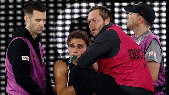 Doctors gave Jones pain relief with the “green whistle” out on the ground.