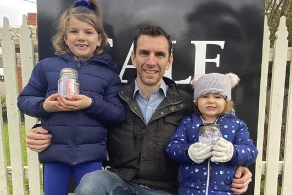 Chris Bellesini with his two young daughters Mackenzie and Genevieve.