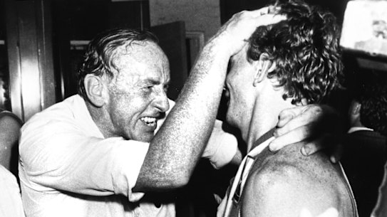 The coaching great celebrates a win during his North Melbourne days in 1985.