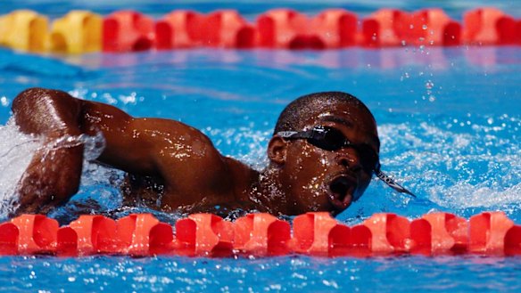 Eric 'The Eel' Moussambani swims the 100 metres in a record-slow time.