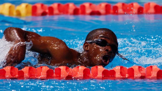 Eric 'The Eel' Moussambani swims the 100 metres in a record-slow time.