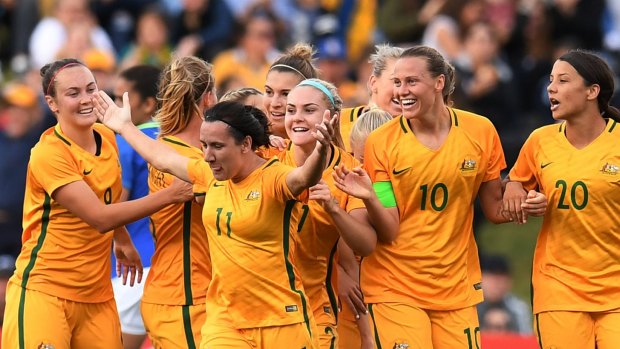 Popular: The Matildas celebrate against Brazil in Penrith last year and could have a bigger crowd for the Chile game.