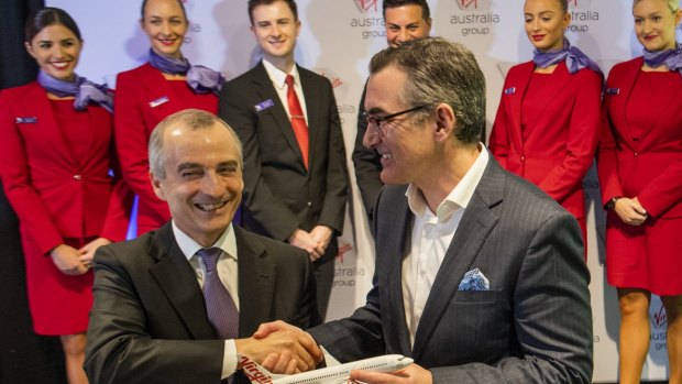 Outgoing CEO John Borghetti with  Paul Scurrah, New Virgin Australia CEO. 