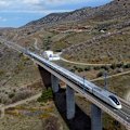 Taking the high-speed AVE train between Madrid and Seville.